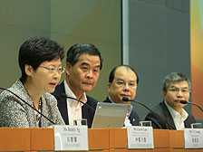 Meet the media: Chief Executive CY Leung (second left), Chief Secretary Carrie Lam (first left), and Secretary for Labour & Welfare Matthew Cheung (third left) attend a media session after the summit.