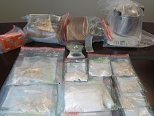 Illicit haul: Customs officers seized cocaine and drug-manufacturing apparatus in a flat in Tai Kok Tsui.