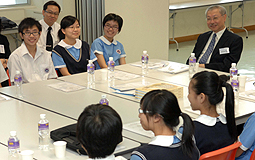 Michael Suen visits school