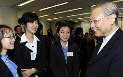 Michael Suen with scholarship recipients