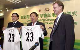 霍震霆與何志平
