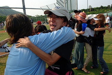 Parents of players cries at the victory of the kids