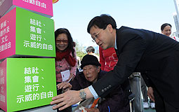 Stephen Lam at a carnival to promote the Basic Law