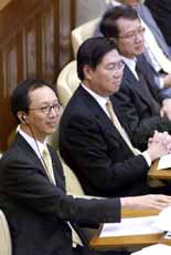 梁錦松出席立法會財務委員會特別會議