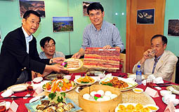 Edward Yau with geopark gourmet dishes